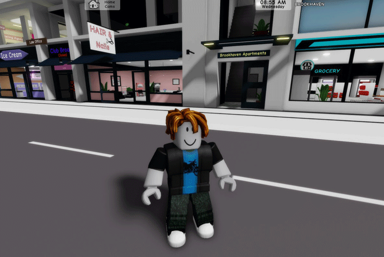 A Roblox character standing on a street with shops and apartments in the background.